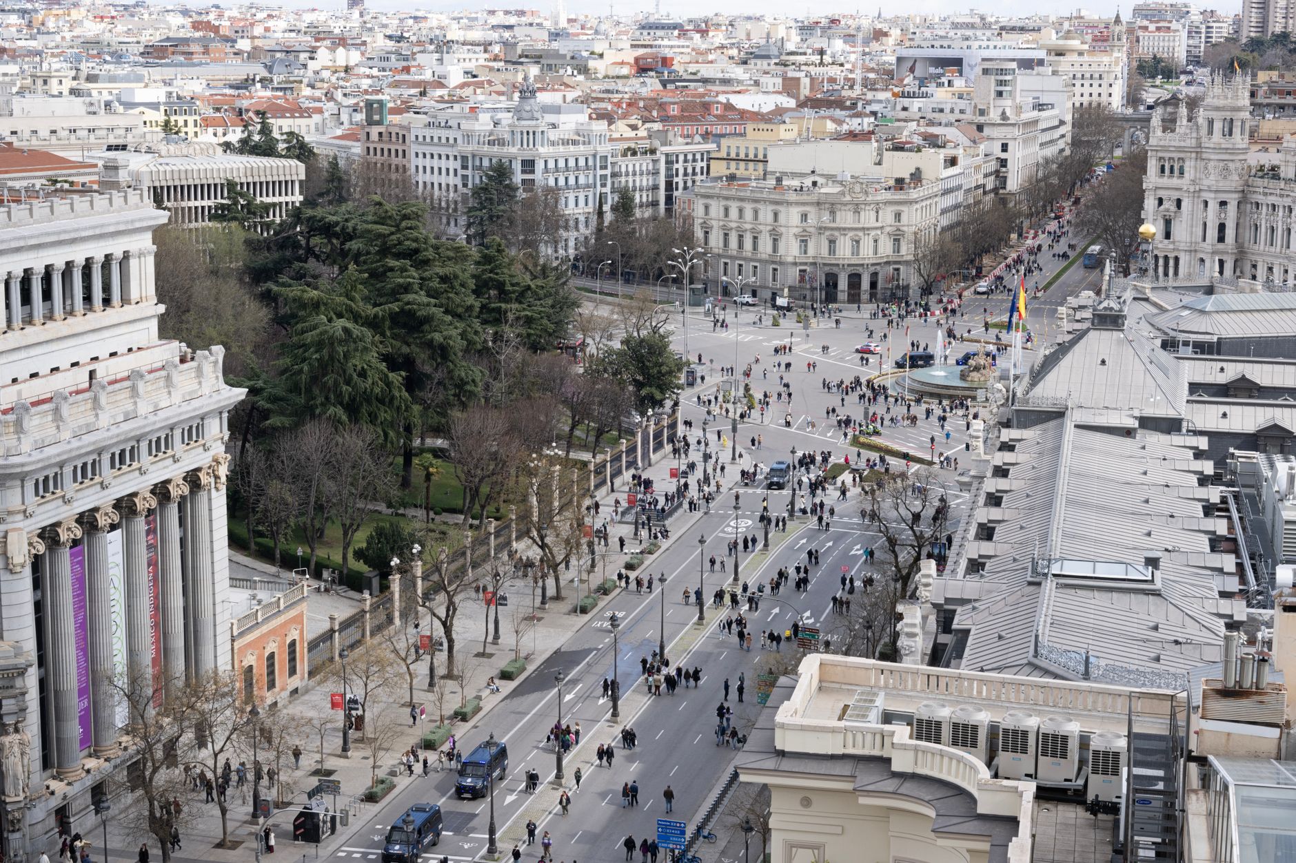 A vibrant aerial view of Madrid showcasing iconic architecture and bustling city life.