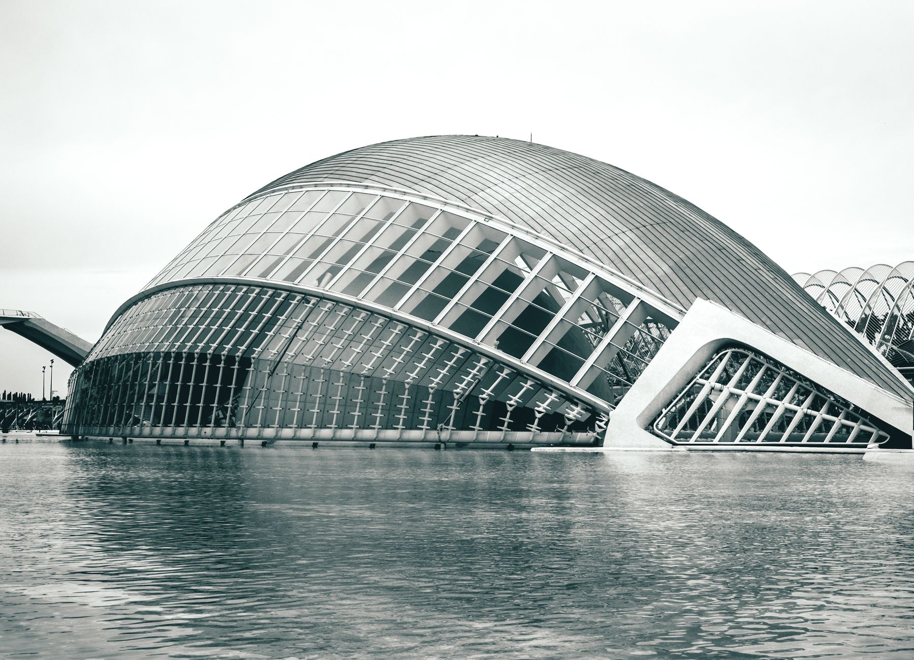Grayscale view of the modern Hemispheric building in Valencia&rsquo;s City of Arts and Sciences.