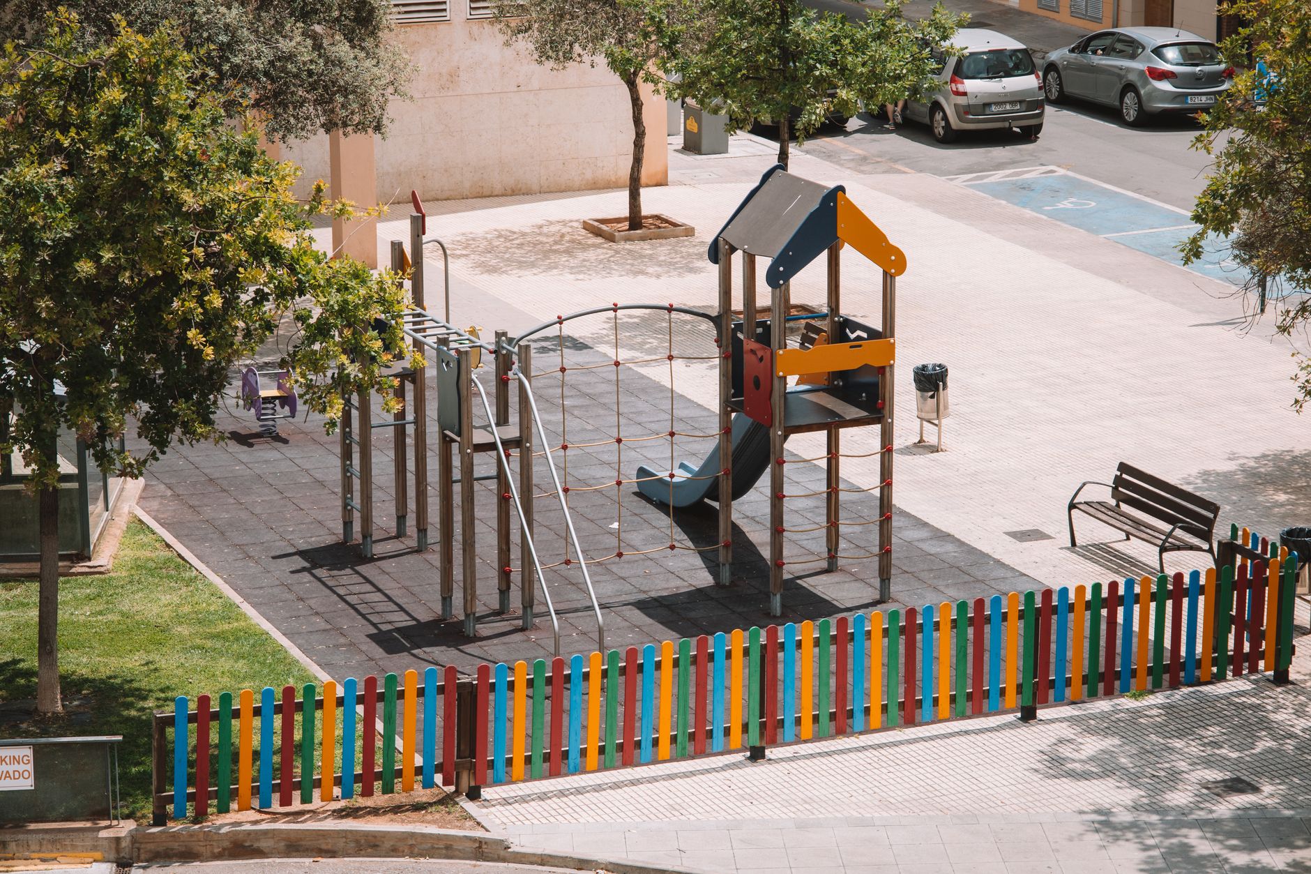 Aerial view of a colorful playground with a slide in Valencia, Spain.